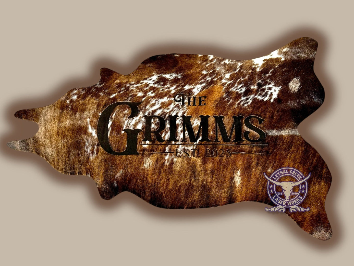 4ft Custom Cowhide Cutout - custom laser engraved cowhide and leather western decor by Lethal Creek Laser Works LLC