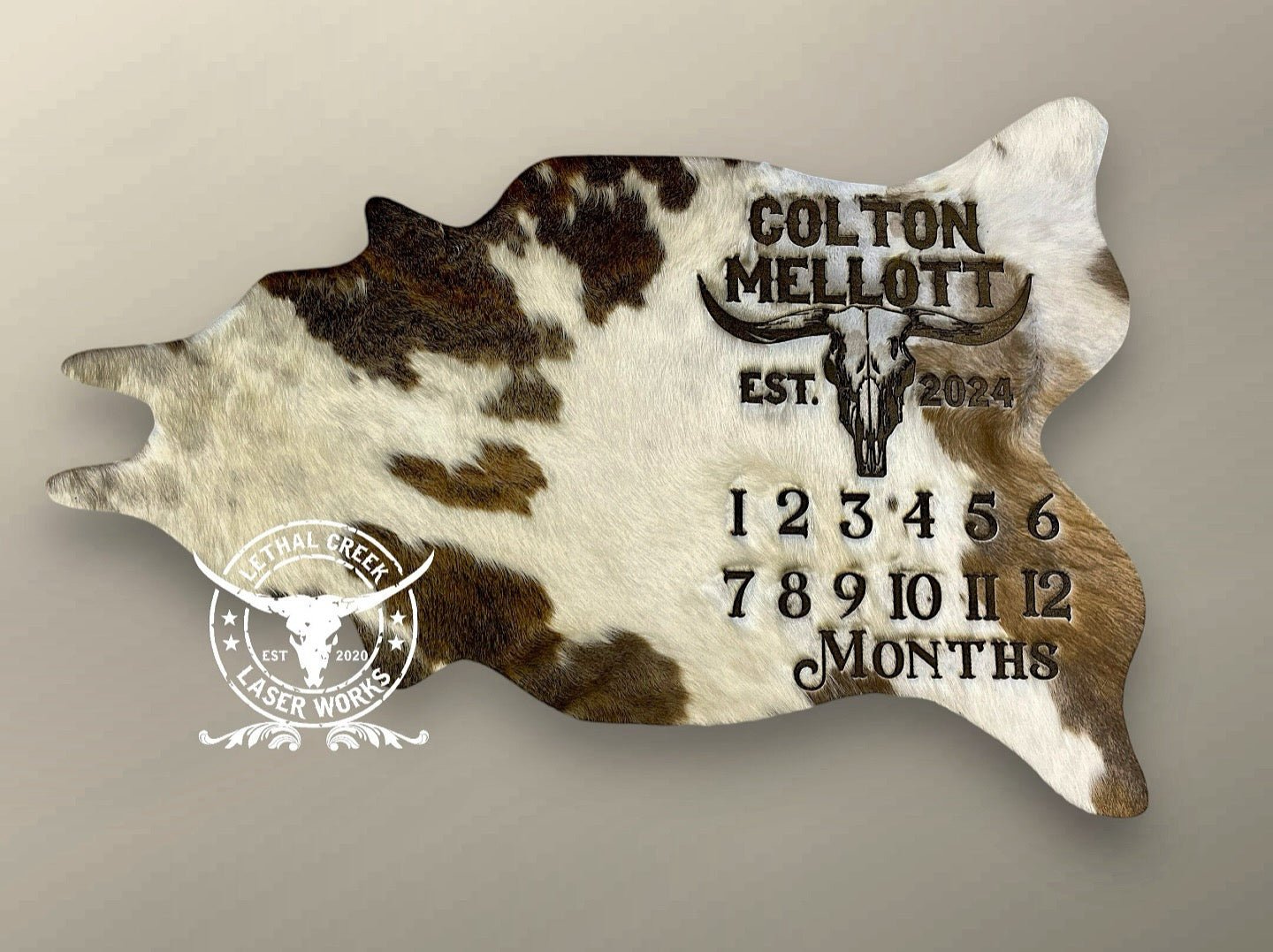 MILESTONE COWHIDE - custom laser engraved cowhide and leather western decor by Lethal Creek Laser Works LLC