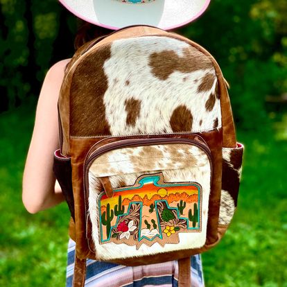 Thunderbird Backpacks - custom laser engraved cowhide and leather western decor by Lethal Creek Laser Works LLC