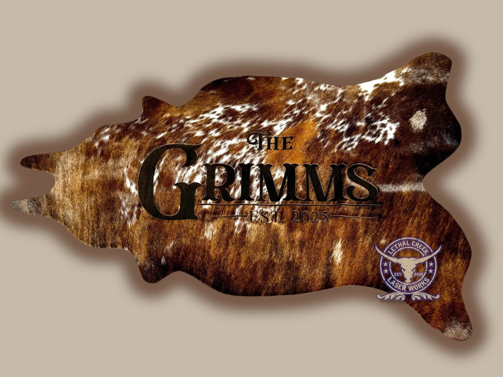 4ft Custom Cowhide Cutout -  custom laser engraved cowhide and leather western decor by Lethal Creek Laser Works LLC