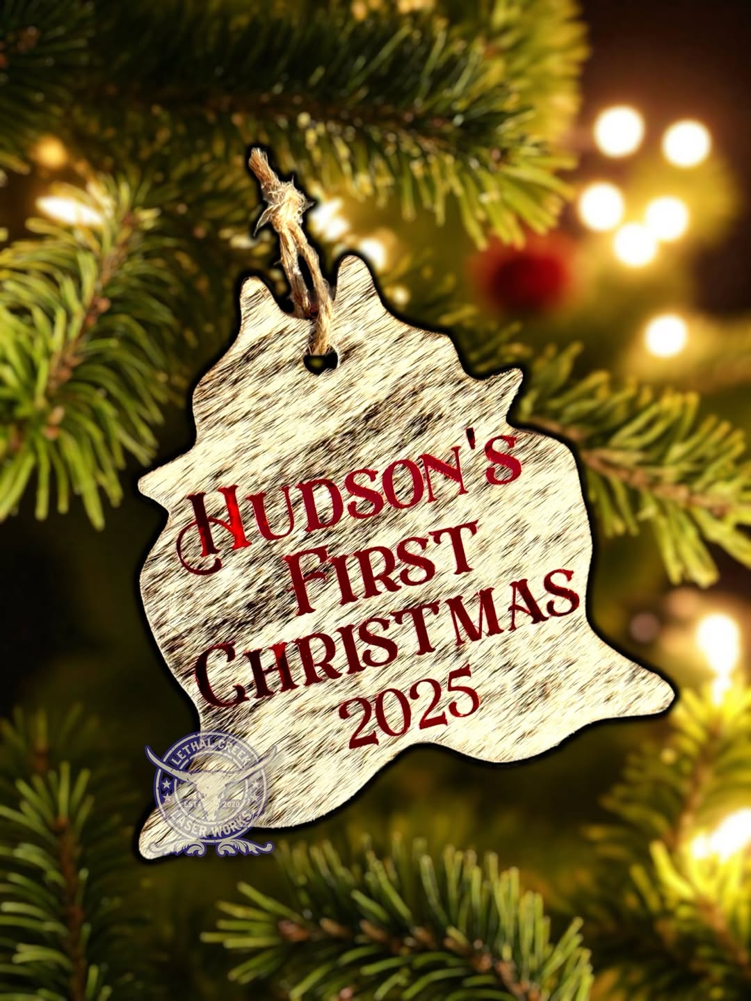 Personalized Baby’s First Christmas cowhide ornament with full-color printed design