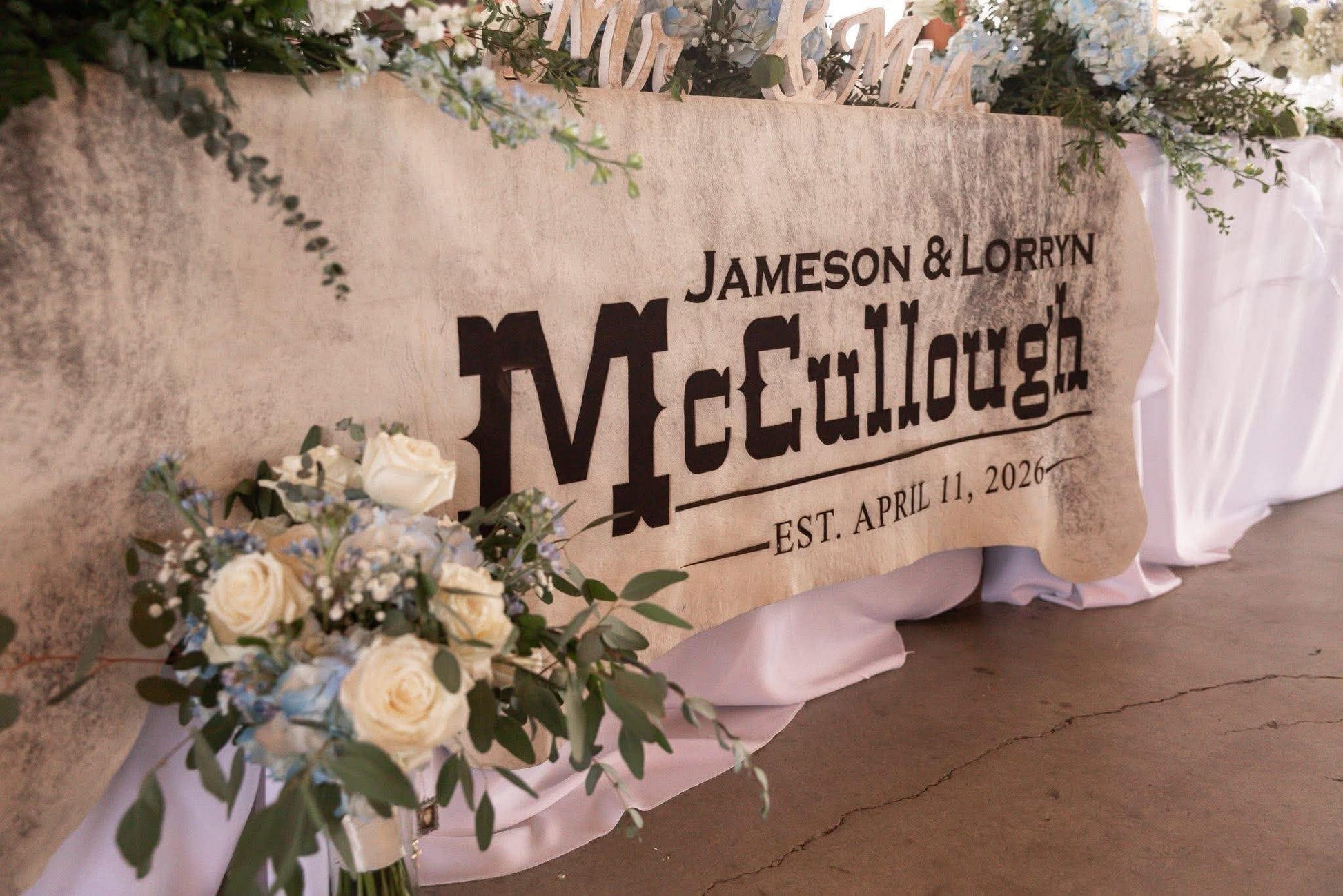 Custom Cowhide Backdrop | Western & Rustic Wedding Decor -  custom laser engraved cowhide and leather western decor by Lethal Creek Laser Works LLC