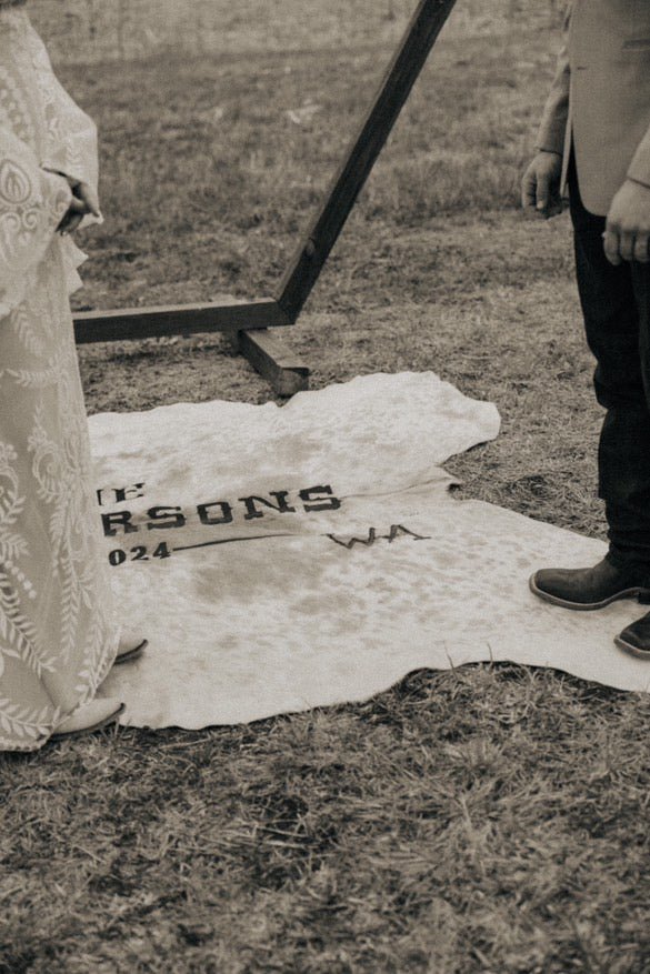 Custom Cowhide Backdrop | Western & Rustic Wedding Decor -  custom laser engraved cowhide and leather western decor by Lethal Creek Laser Works LLC