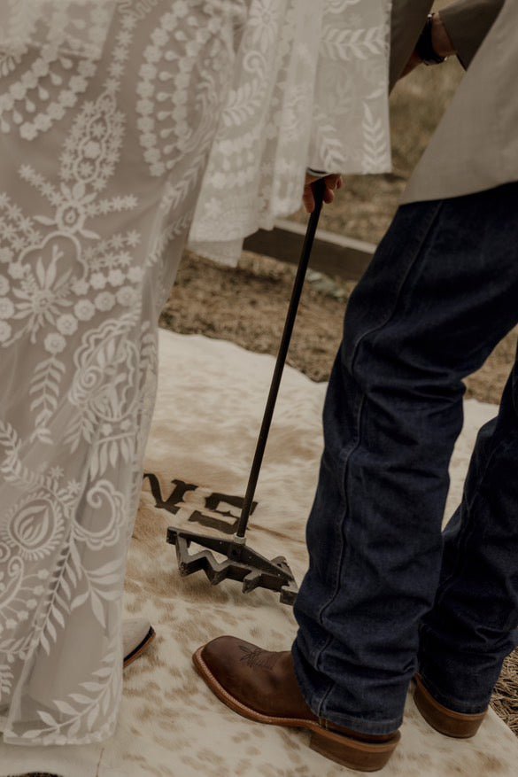Custom Cowhide Backdrop | Western & Rustic Wedding Decor -  custom laser engraved cowhide and leather western decor by Lethal Creek Laser Works LLC
