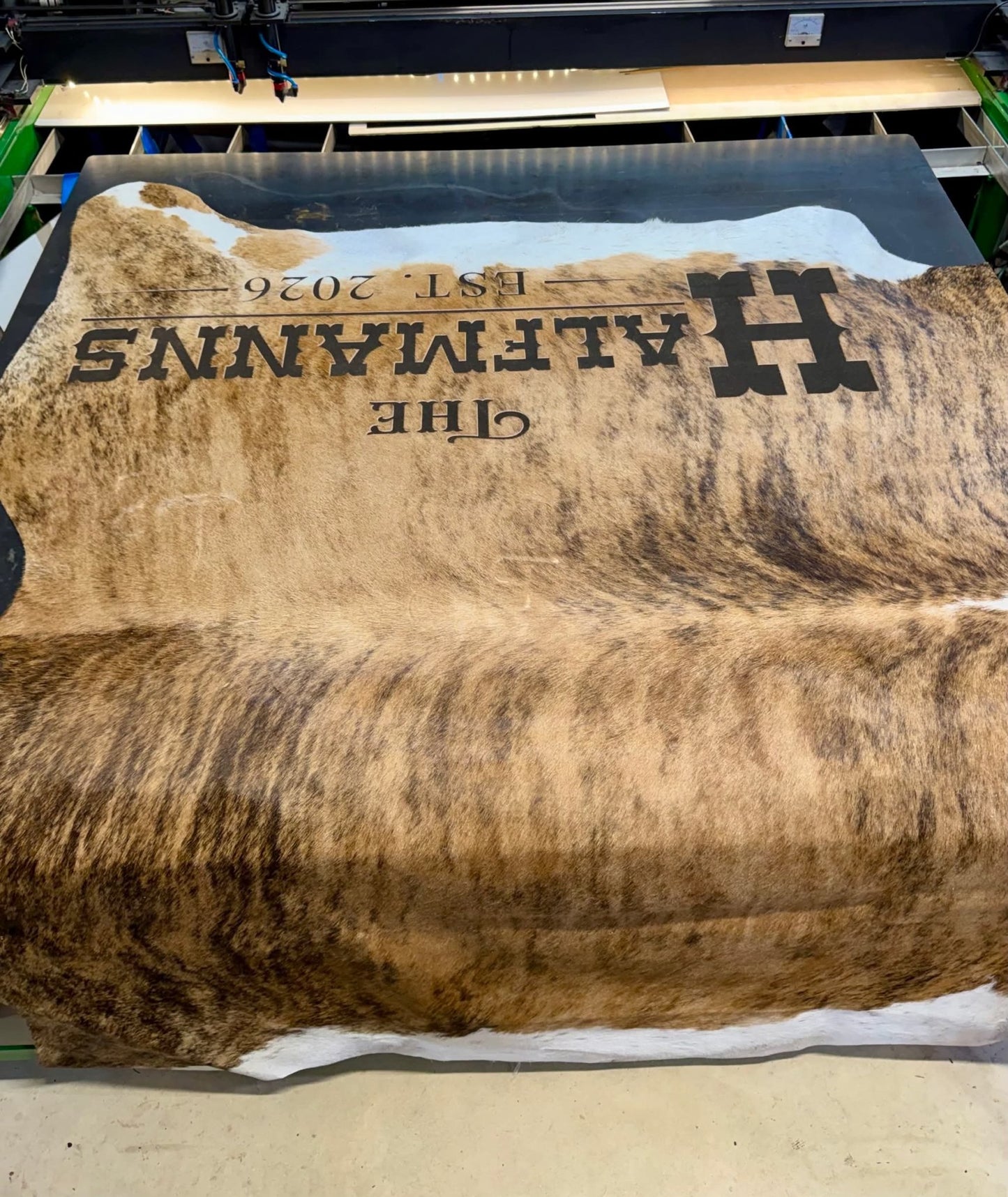 Custom Cowhide Backdrop | Western & Rustic Wedding Decor -  custom laser engraved cowhide and leather western decor by Lethal Creek Laser Works LLC