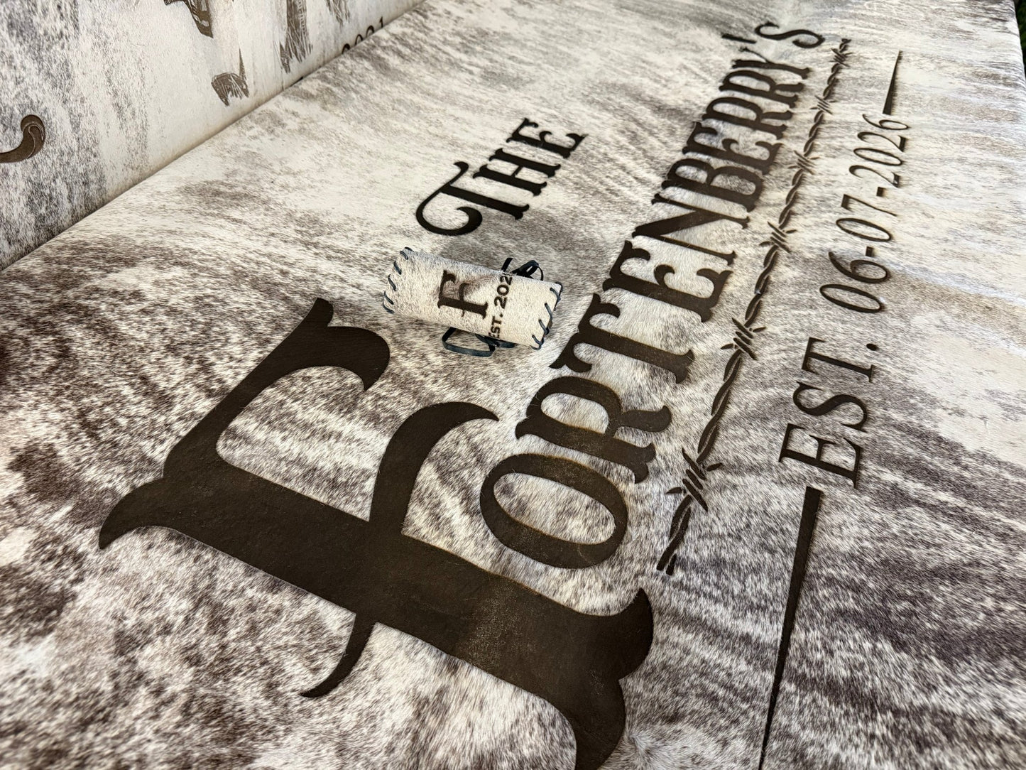 Custom Cowhide Wedding Backdrop & Bouquet Wrap for Rustic Western Weddings -  custom laser engraved cowhide and leather western decor by Lethal Creek Laser Works LLC