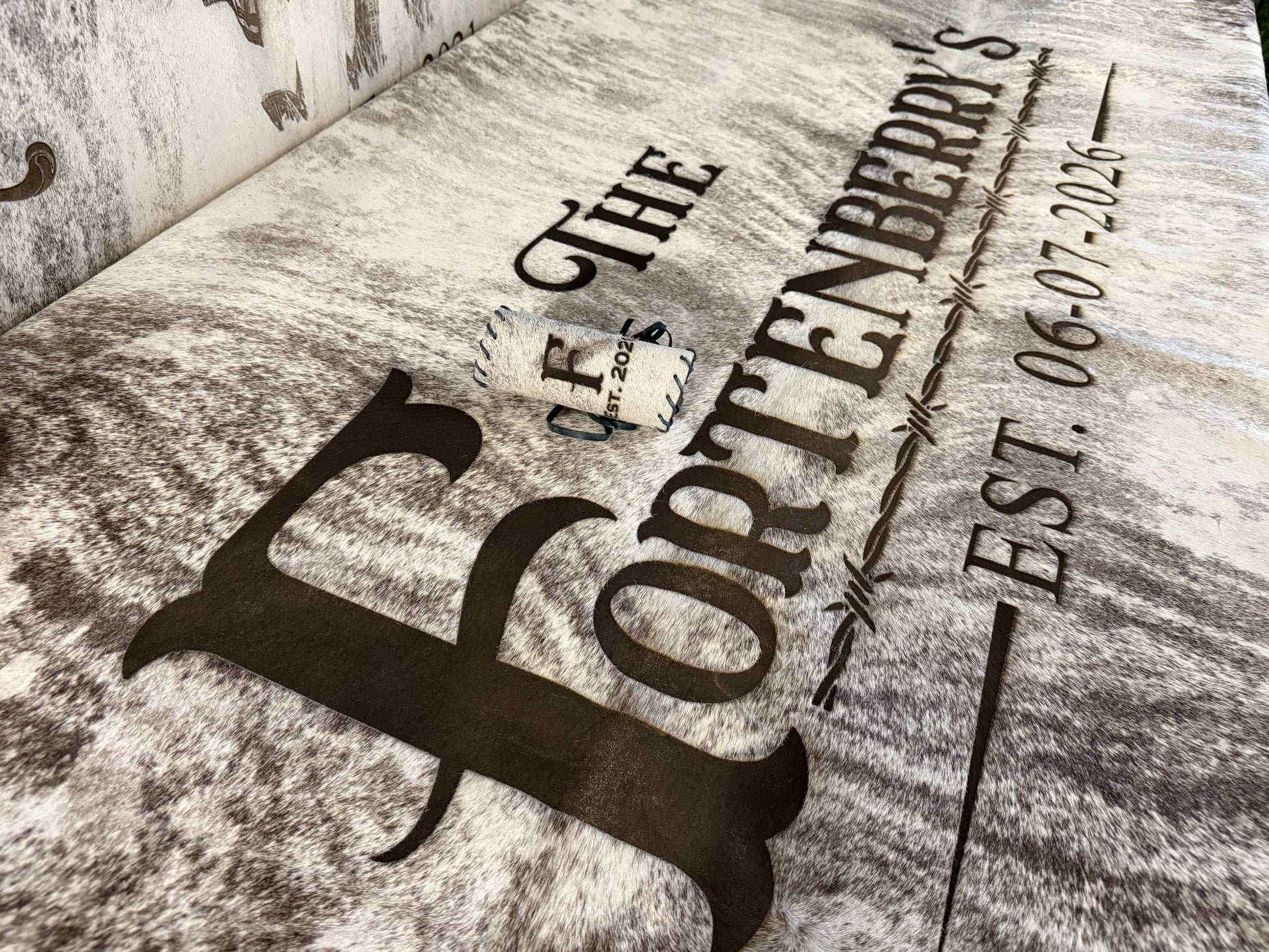 Custom Cowhide Wedding Backdrop & Bouquet Wrap for Rustic Western Weddings -  custom laser engraved cowhide and leather western decor by Lethal Creek Laser Works LLC
