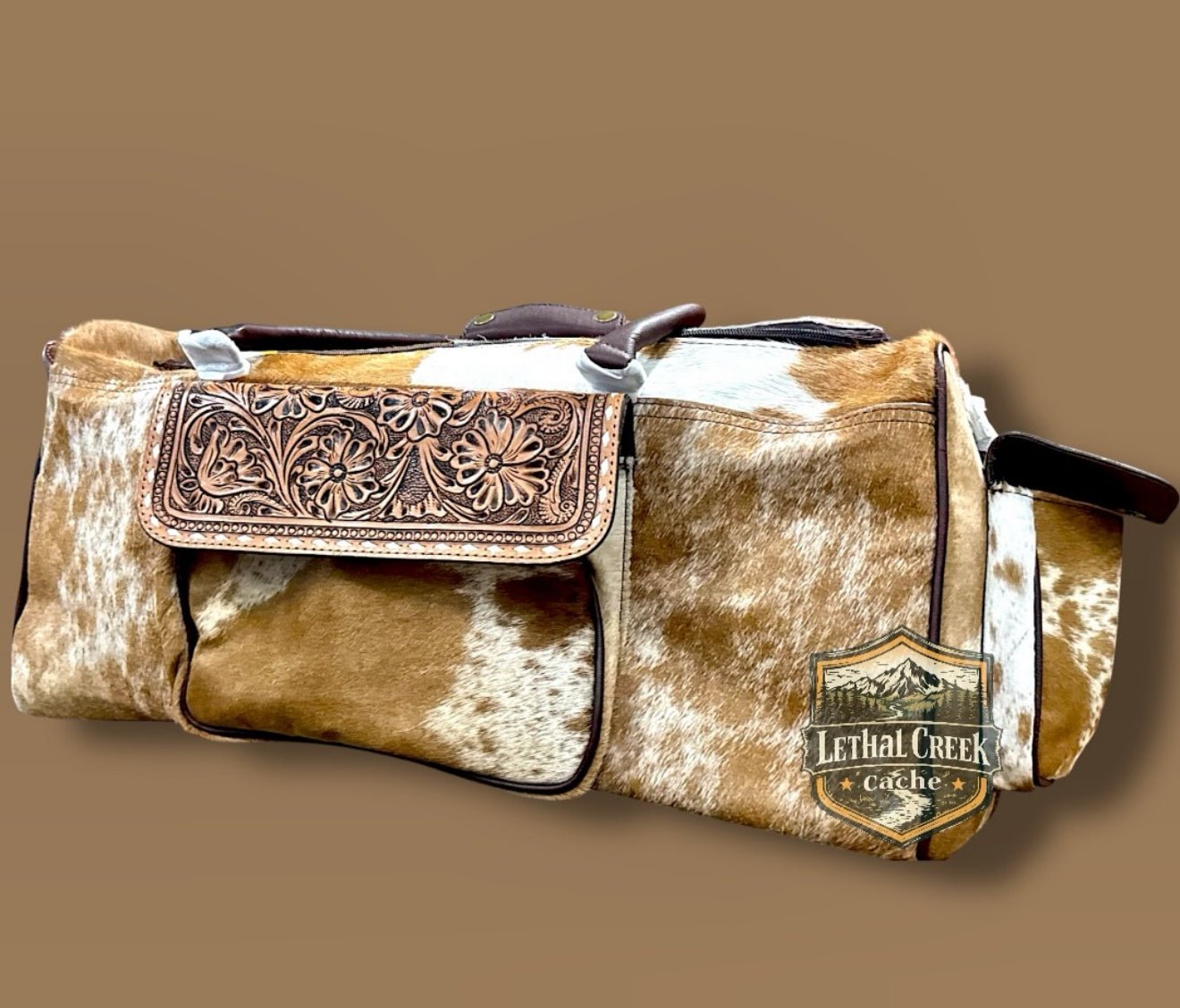 DUFFLE BAG -  custom laser engraved cowhide and leather western decor by Lethal Creek Laser Works LLC