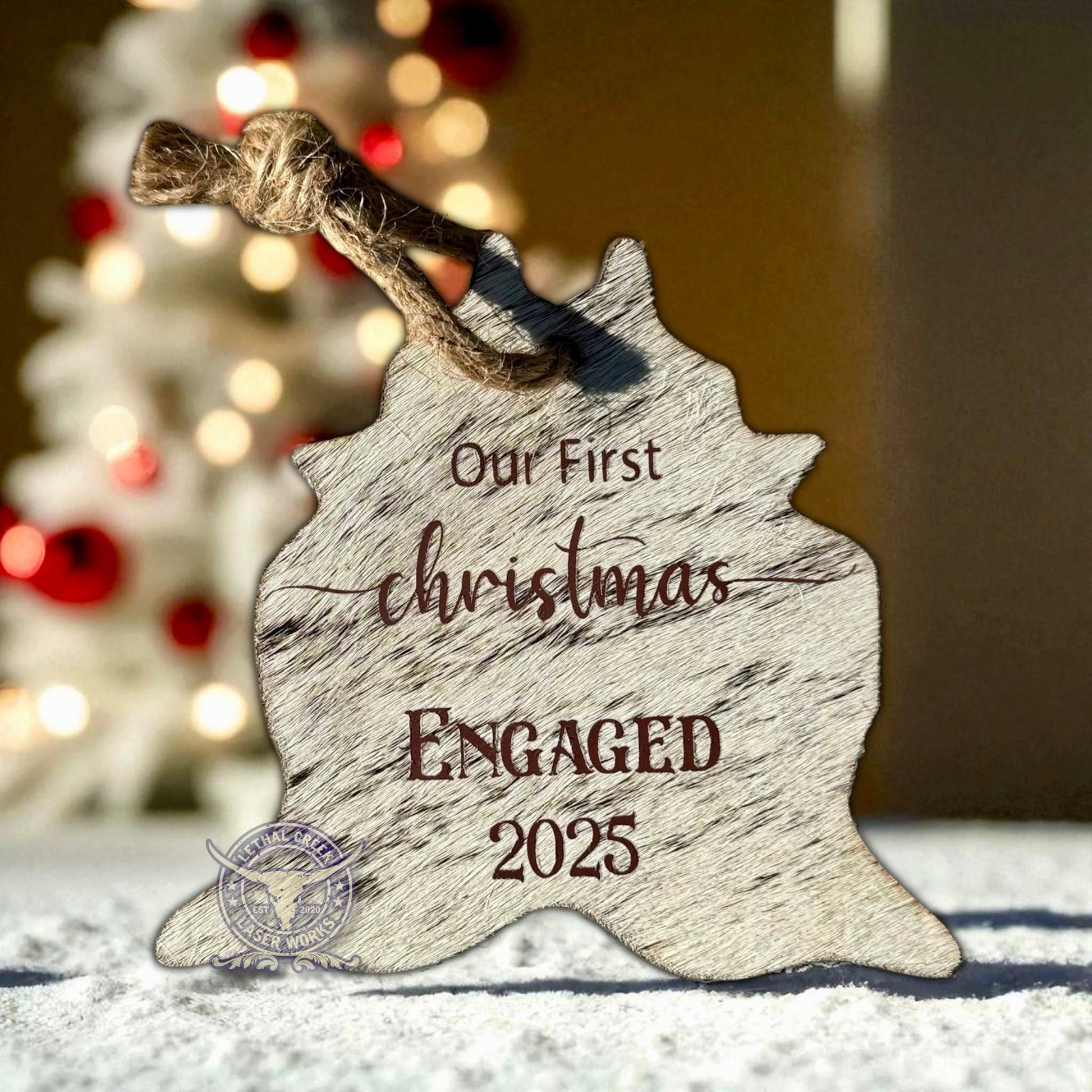 Personalized First Christmas Engaged cowhide ornament with date and western printed design
