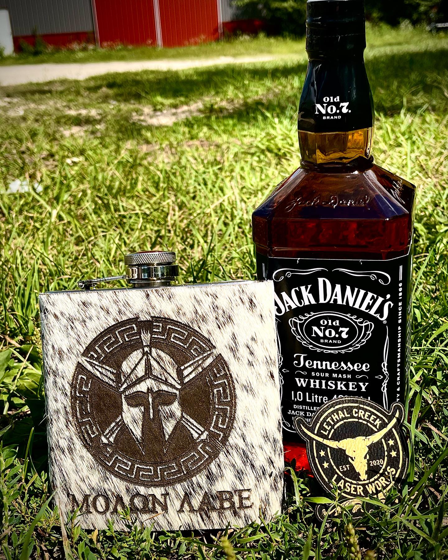 Get Branded Cowhide Flasks 16oz -  custom laser engraved cowhide and leather western decor by Lethal Creek Laser Works LLC
