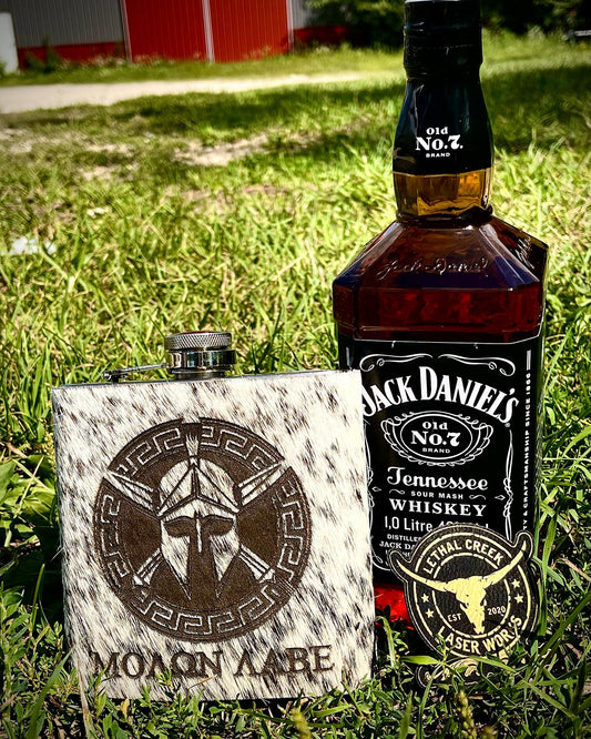 Get Branded Cowhide Flasks 16oz -  custom laser engraved cowhide and leather western decor by Lethal Creek Laser Works LLC