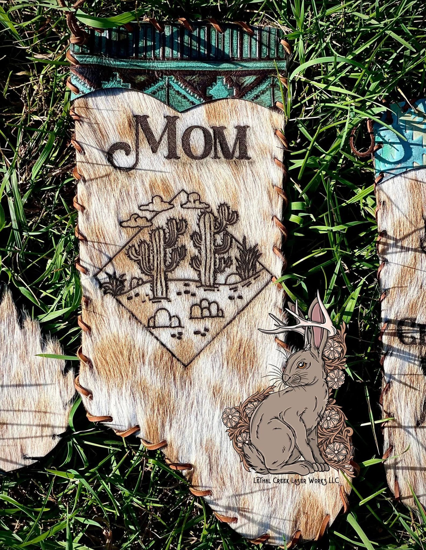 Custom Mom cowhide Christmas stocking with personalized western artwork and fur accents