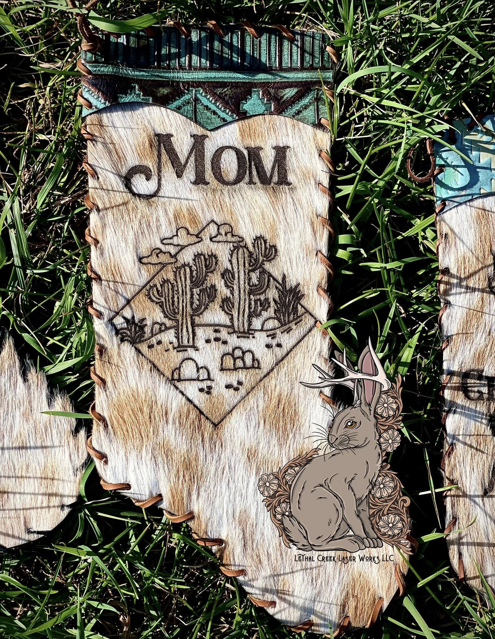 Custom Mom cowhide Christmas stocking with personalized western artwork and fur accents