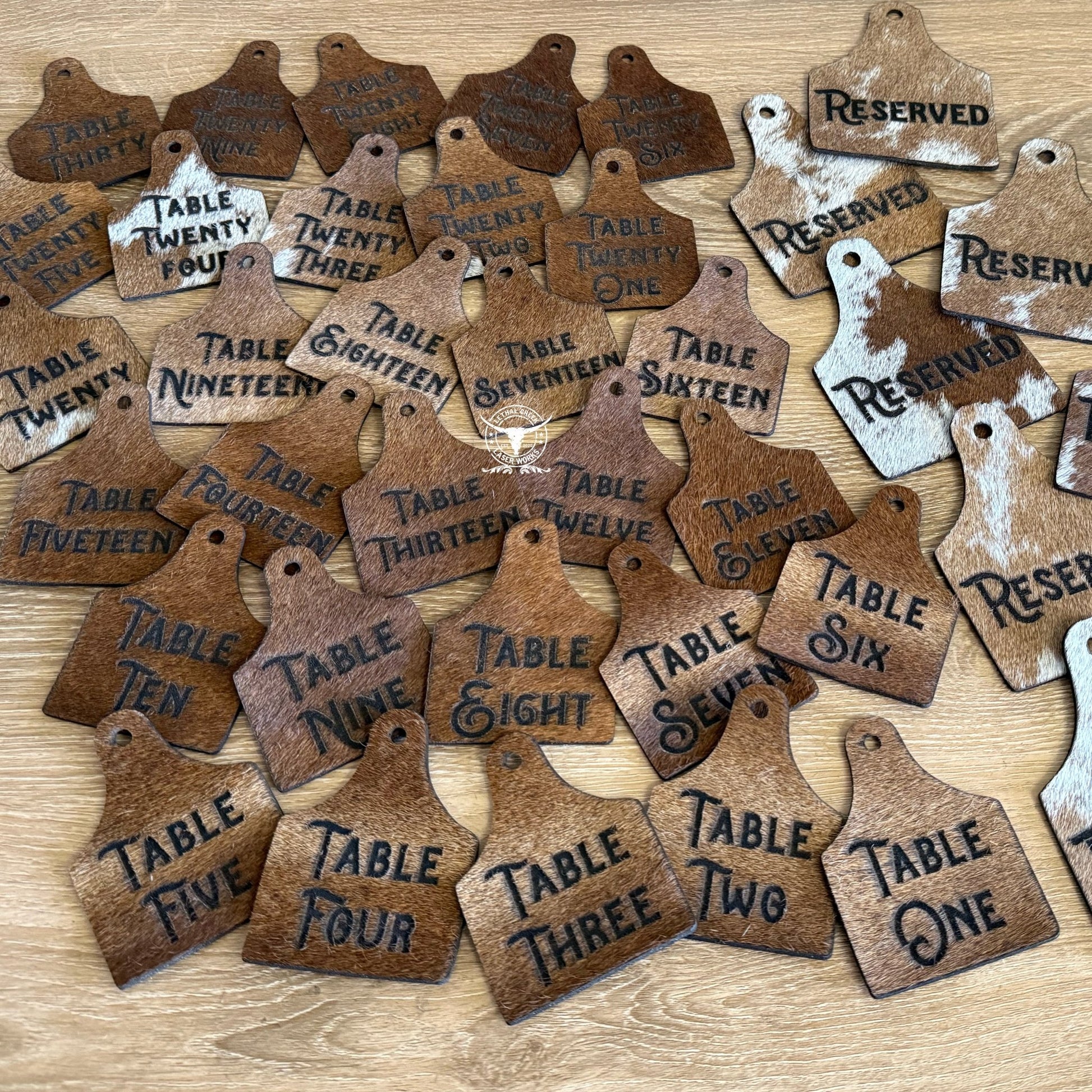 Rustic Cowhide Wedding Table Numbers | Custom Western Table Numbers for Ranch Weddings -  custom laser engraved cowhide and leather western decor by Lethal Creek Laser Works LLC