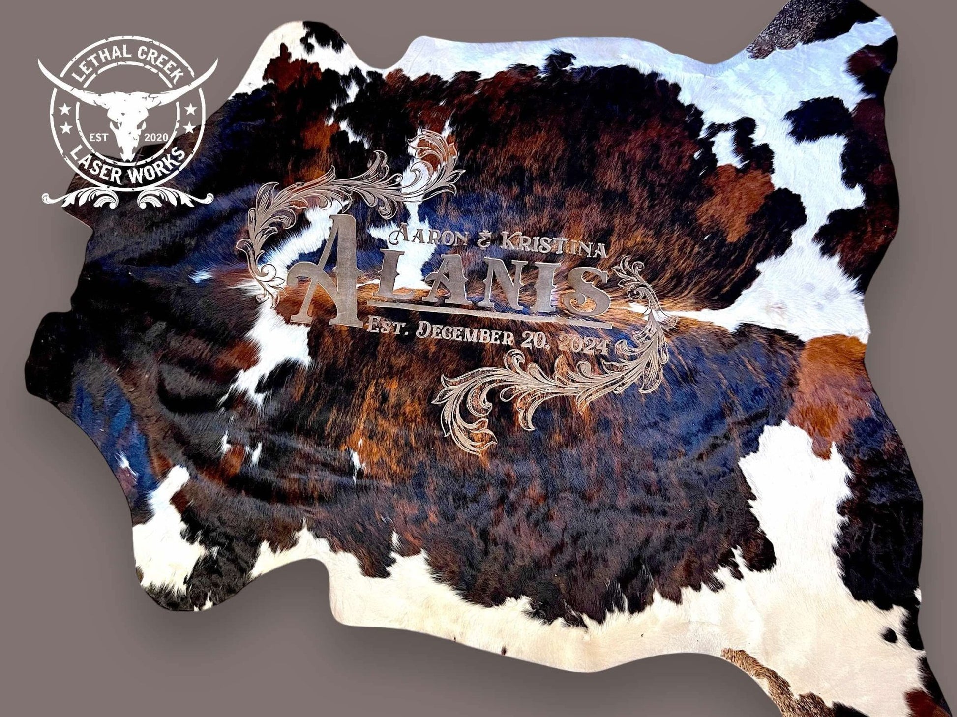 The Legacy Custom Cowhide -  custom laser engraved cowhide and leather western decor by Lethal Creek Laser Works LLC