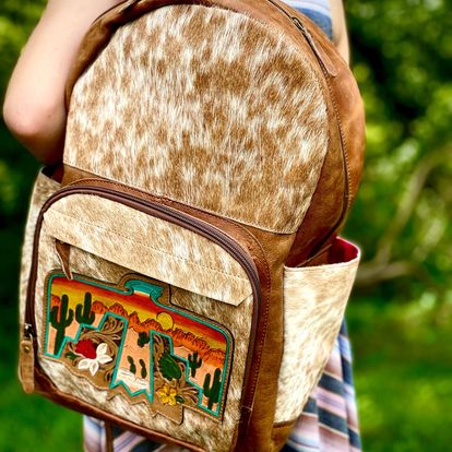 Thunderbird Backpack -  custom laser engraved cowhide and leather western decor by Lethal Creek Laser Works LLC