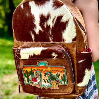 Thunderbird Backpacks -  custom laser engraved cowhide and leather western decor by Lethal Creek Laser Works LLC